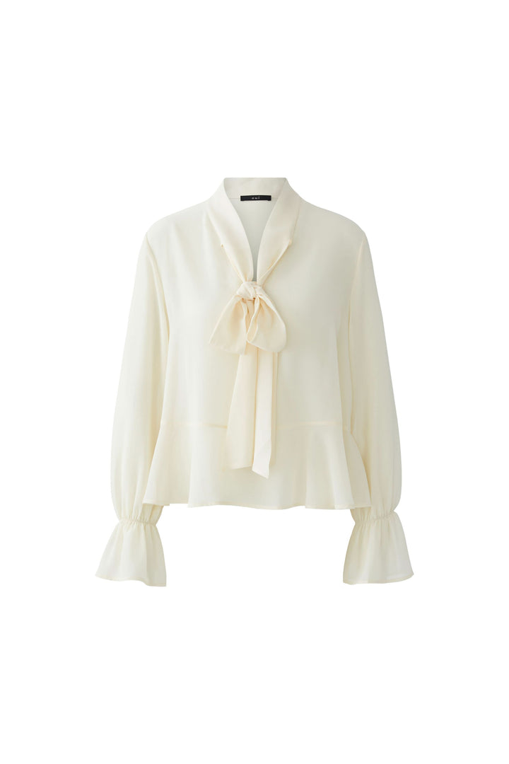 Flowing blouse with tied collar