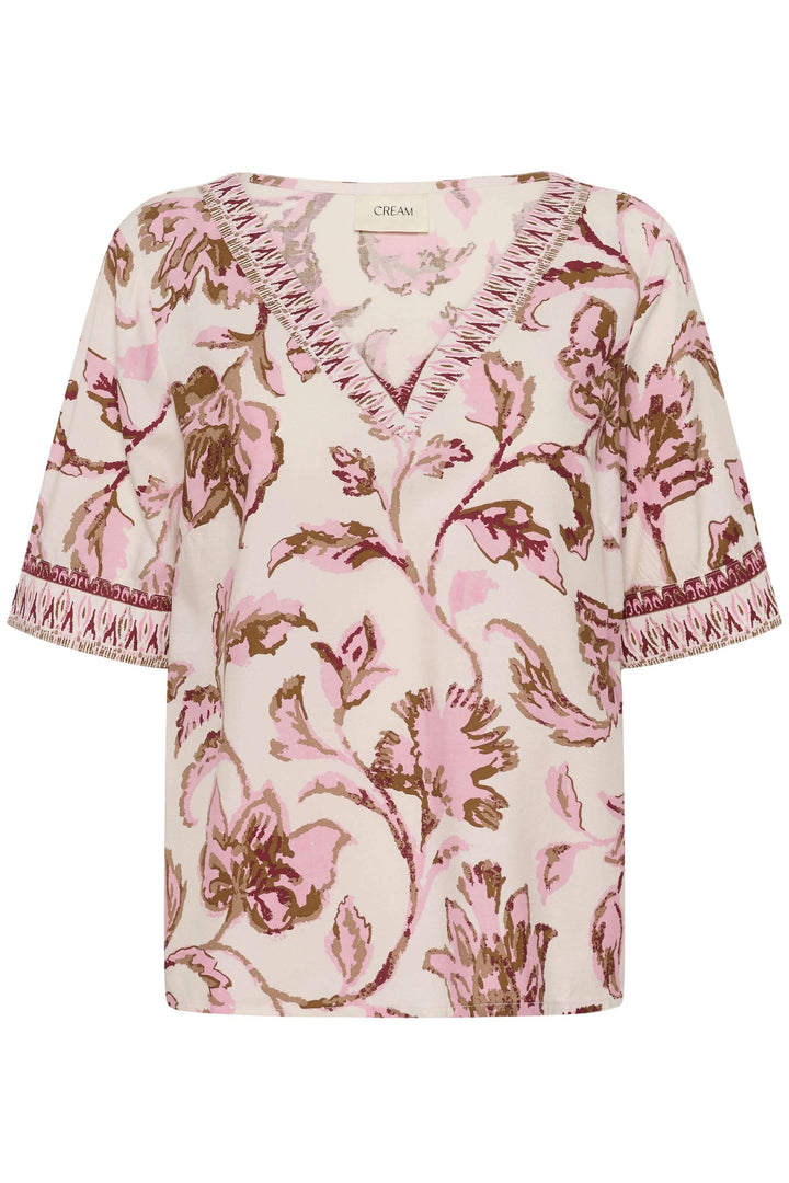 Blouse Tiah fluide à motif floral avec encolure en V et manches courtes, parfaite pour un style léger et élégant en été.