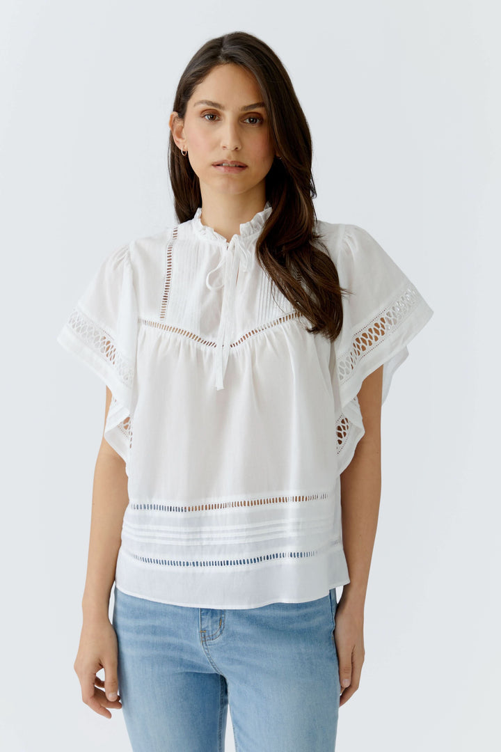 Flowy blouse with openwork details