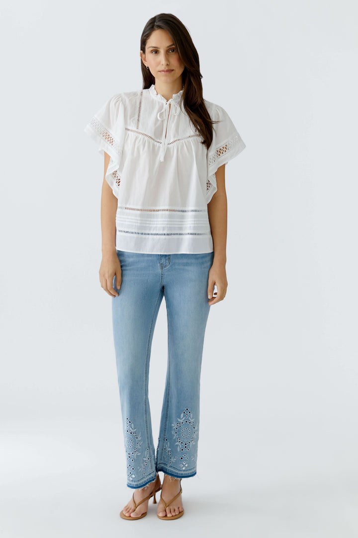 Flowy blouse with openwork details