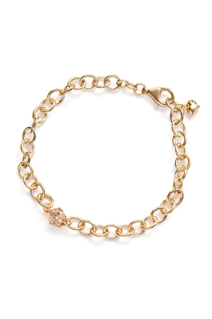 Bracelet en or vermeil 14 carats avec breloque en zirconium scintillant, élégant et moderne.