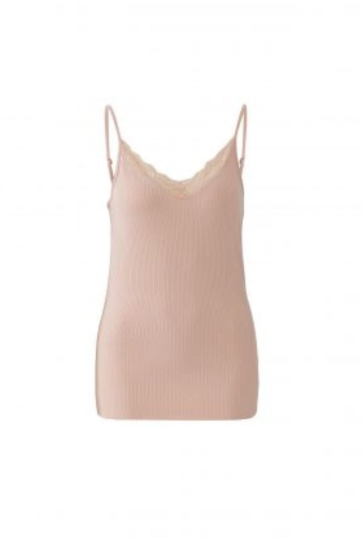 Camisole côtelée à bretelles fines en tissu extensible, idéale pour un style minimaliste et ajusté. Décris moi le produit en français.