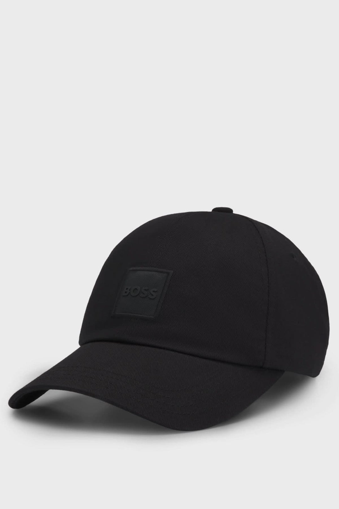 Casquette BOSS noire avec écusson ton sur ton, style contemporain et élégant, parfaite pour l'été.