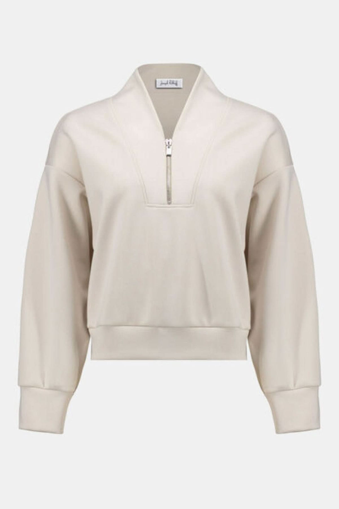 Chandail à col montant moderne avec demi-zip, manches longues, et finition minimaliste pour un style polyvalent et confortable.