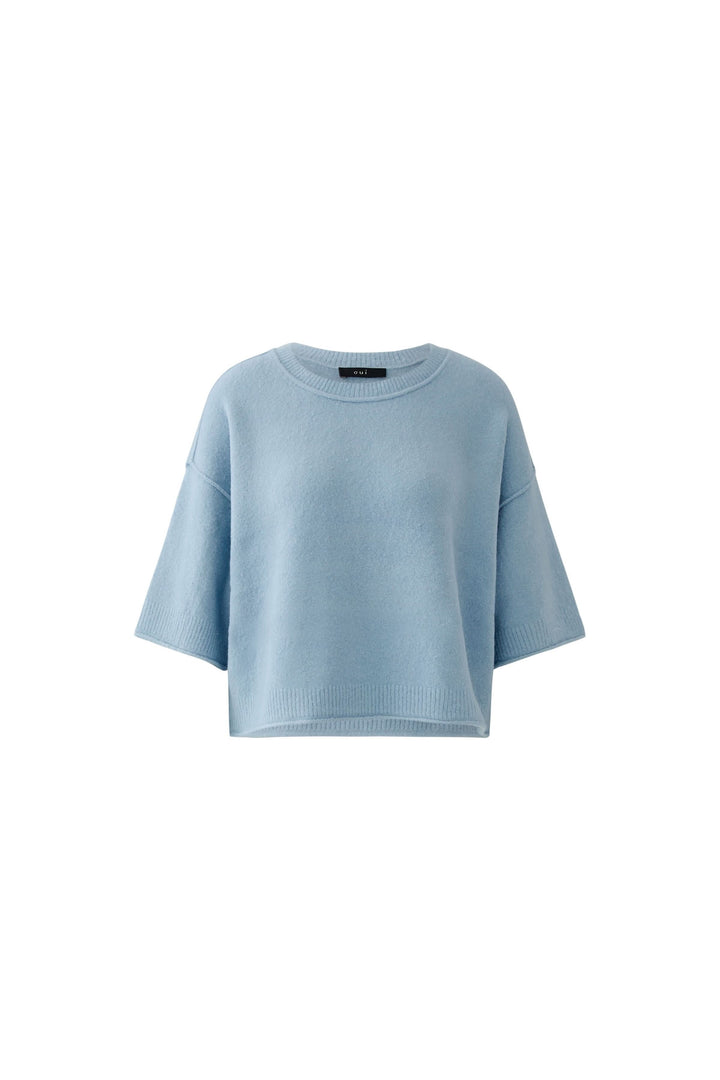 Chandail court en maille douce à manches larges en bleu, coupe moderne et confortable, manches courtes larges, maille douce.