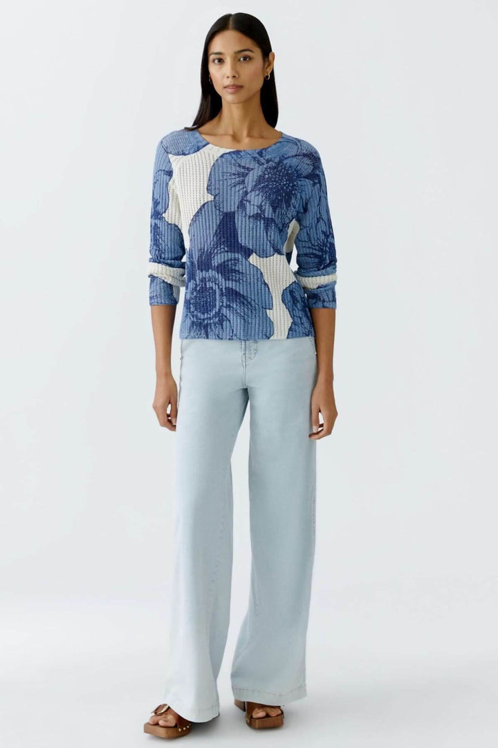 Chandail en tricot côtelé à motif floral, coupe décontractée, idéal pour les looks modernes.