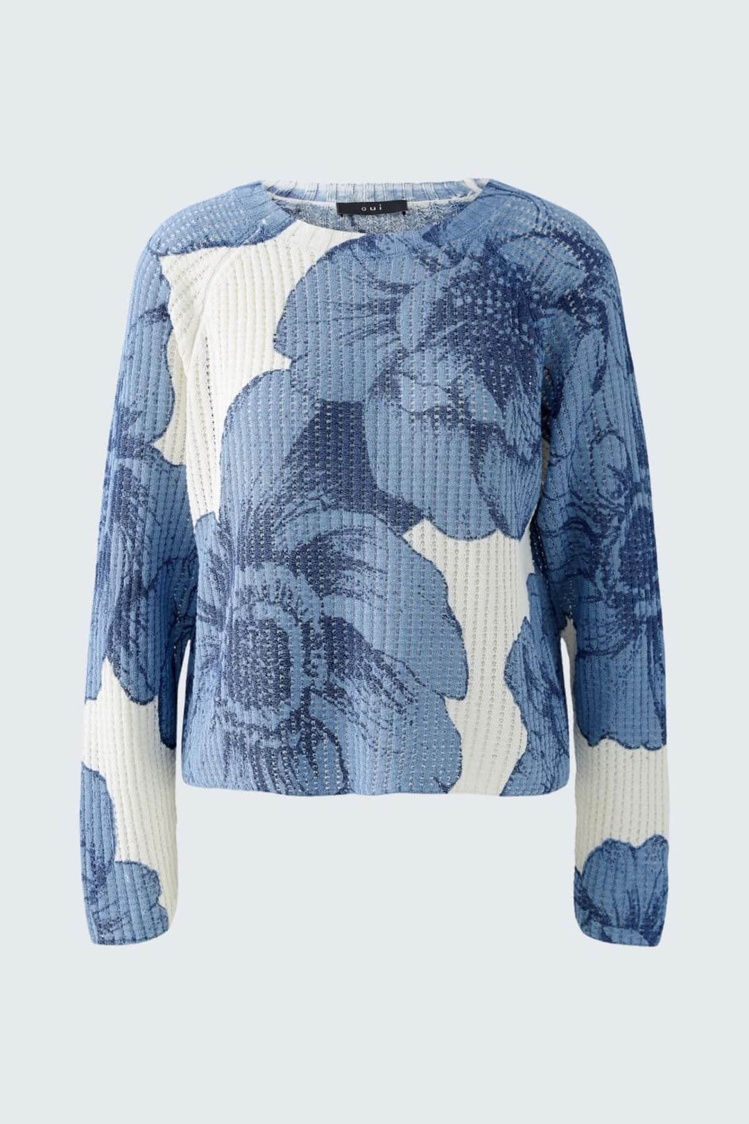 Chandail en tricot côtelé à motifs floraux bleus, coupe décontractée et encolure ronde, idéal pour un look moderne.