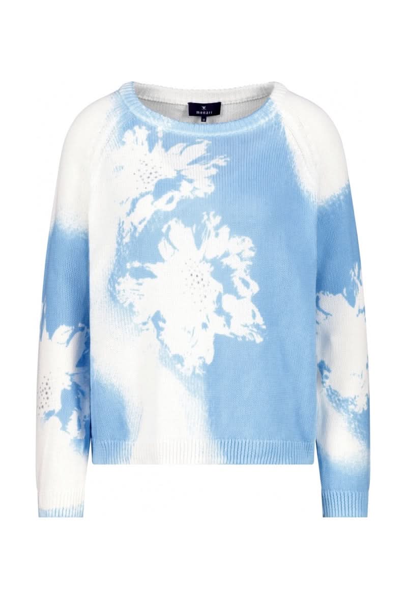 Chandail imprimé floral bleu clair avec motif vaporeux et encolure ronde, parfait pour le printemps.