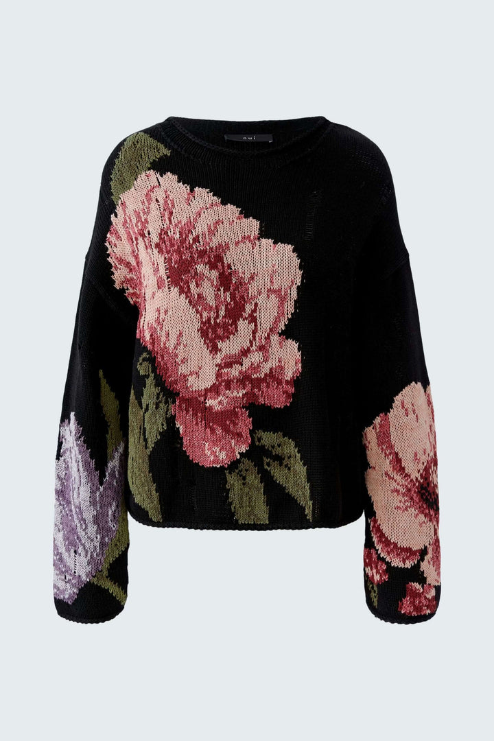Chandail imprimé floral avec motif expressif, coupe décontractée et encolure ronde, ajoutant une touche artistique et confortable.