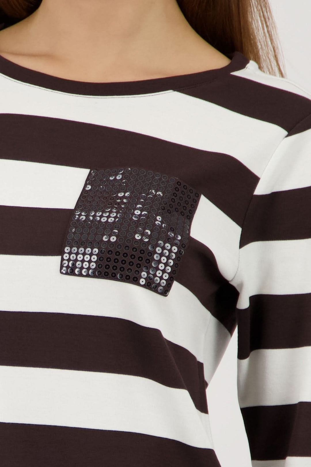 Striped sweater with a decorative pocket