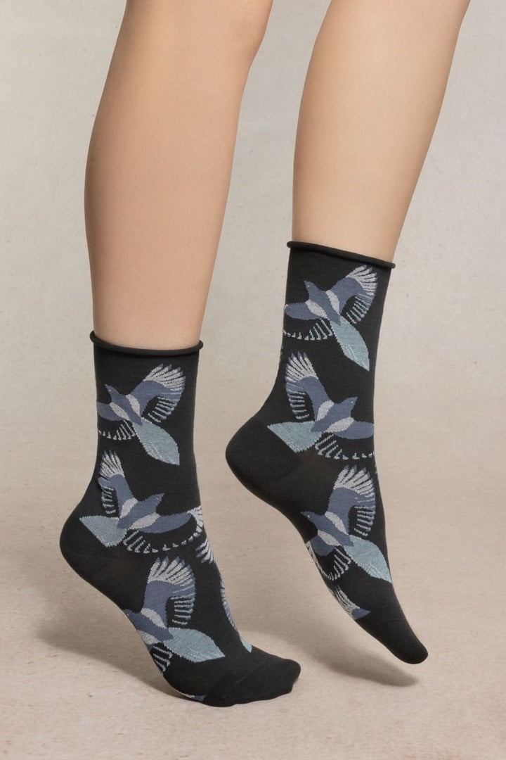 Chaussettes à motif d’oiseaux, élégantes et confortables, en coton noir avec motifs d’oiseaux en vol, longueur mi-mollet.
