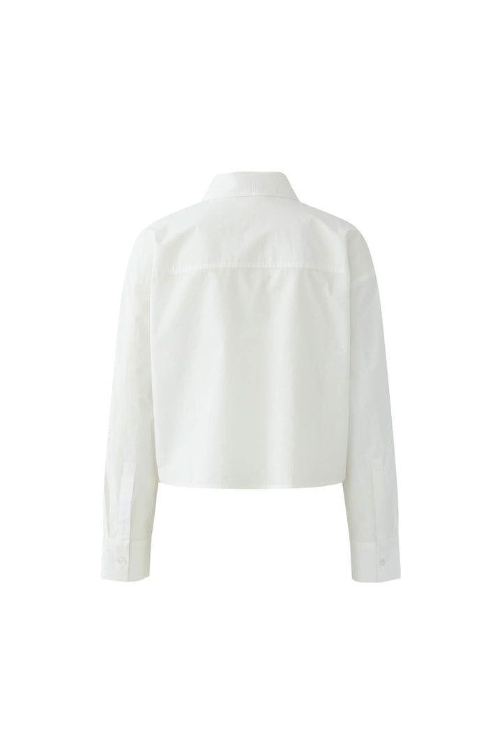 Chemise coupe moderne avec broderies florales et col structuré, vue arrière. Élégante et facile à porter au quotidien.
