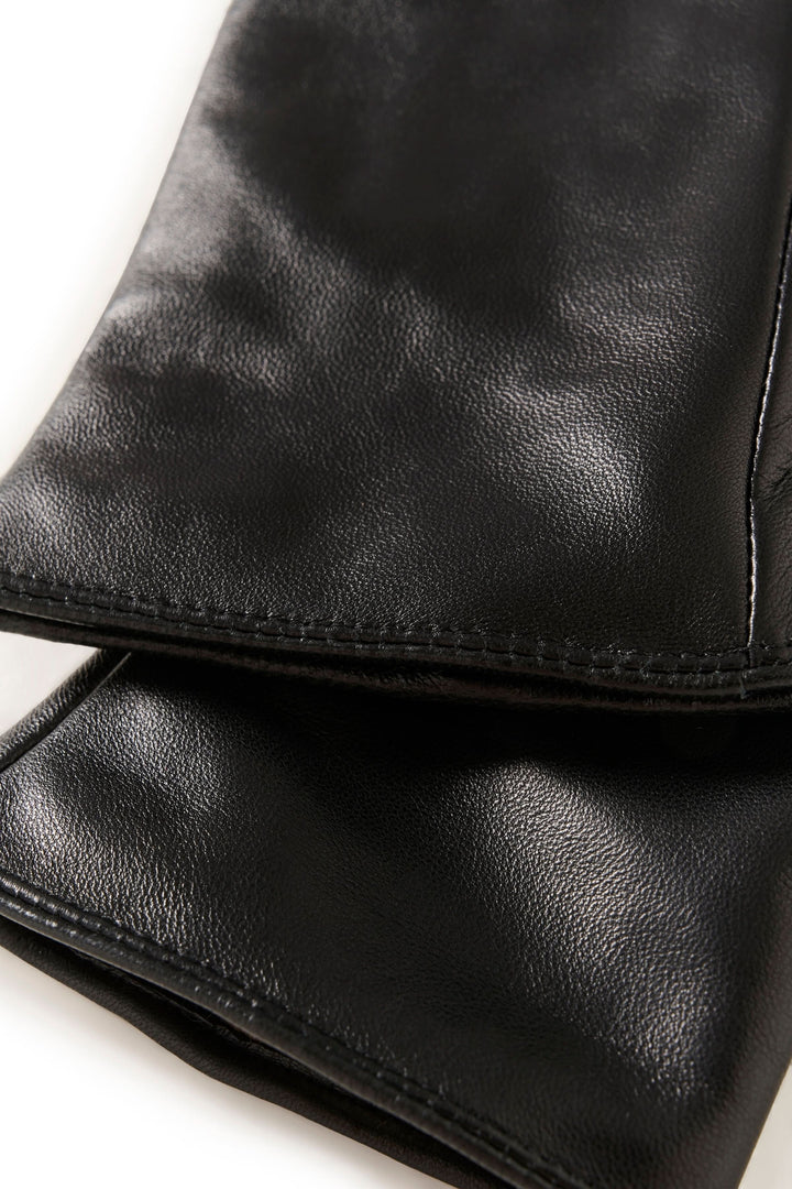 Gant Carrin en cuir véritable noir, élégant et fonctionnel pour les journées froides, coupe ajustée garantie confort et chaleur.