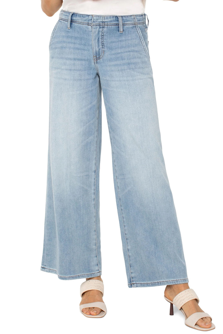 Jean The Weekender jambe très large taille haute, moderne et élégant, parfaite coupe ample et confort optimal, décrit en français.