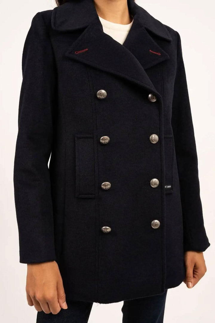 Manteau de laine ST BRIAC III noir à double boutonnage métallique avec col cranté, idéal pour un look marin et urbain, porté par mannequin.