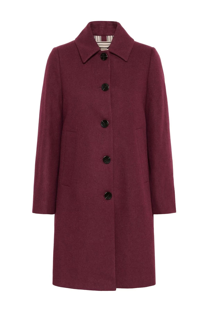 Manteau en laine Kamillas avec coupe droite, col chemise et fermeture boutonnée, parfait pour une allure hivernale chic et élégante.