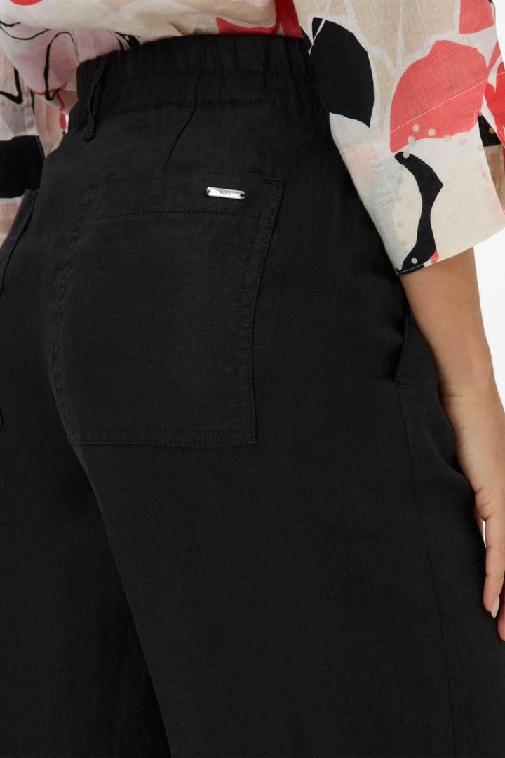 Détails du pantalon en lin MAINE S pour femmes, montrant la taille élastique et les poches arrière.