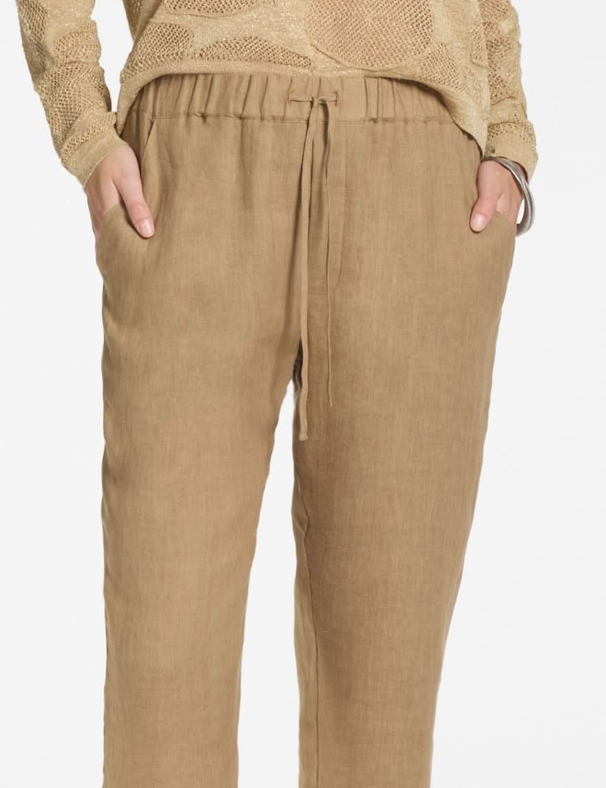 Pantalon en lin à taille élastique beige avec cordon, coupe décontractée pour un confort quotidien.