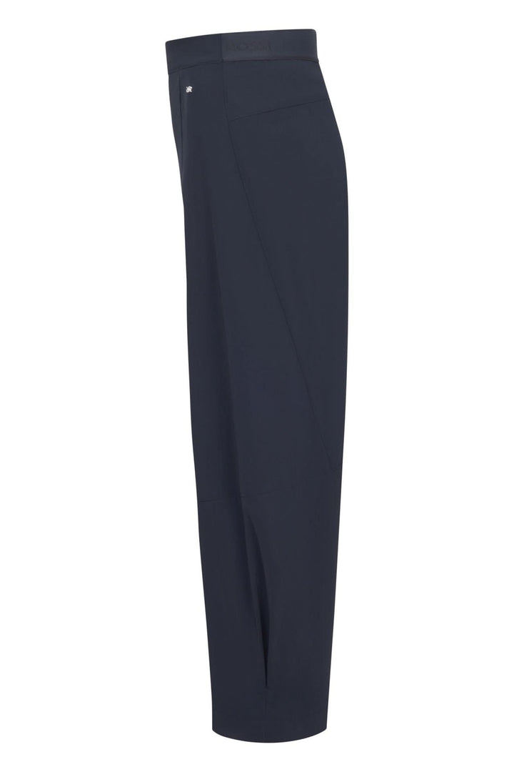 Vue latérale du pantalon fluide à jambe large, avec taille structurée et tissu élégant, idéal pour un style moderne et confortable.