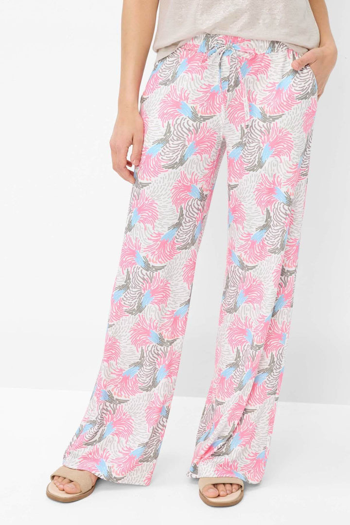 Pantalon imprimé Maine avec motif tropical, coupe ample et fluide, idéal pour un look décontracté et estival.