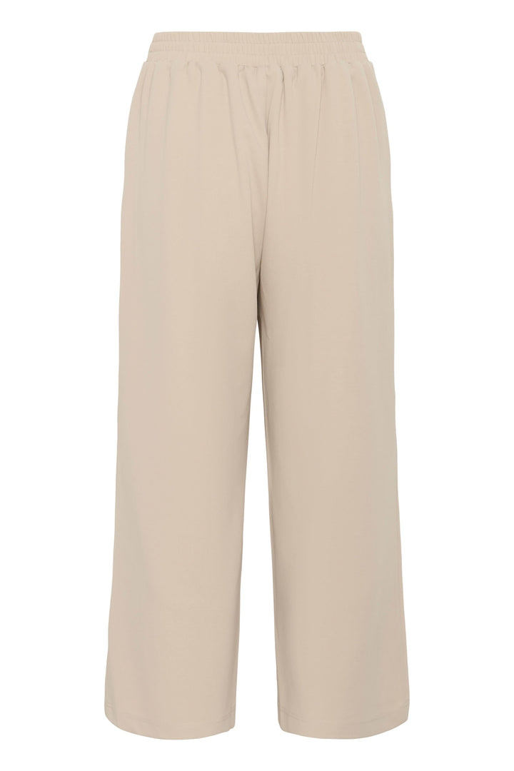 Pantalon jambe large Phoebe beige à taille mi-haute avec ceinture intégrée, élégance et confort pour un style polyvalent.