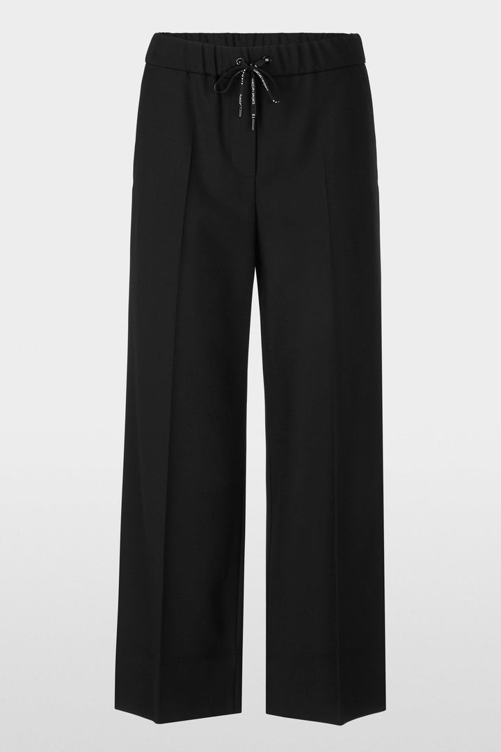 Pantalon large noir à taille élastique avec cordon de serrage pour un style urbain et confortable.