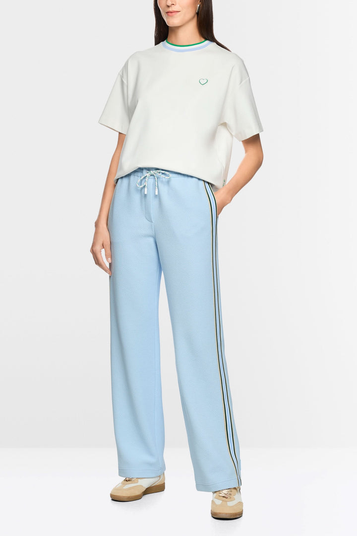 Pantalons à coupe large WASHINGTON bleus avec bandes contrastantes et taille élastique. Style moderne et décontracté pour un confort quotidien.