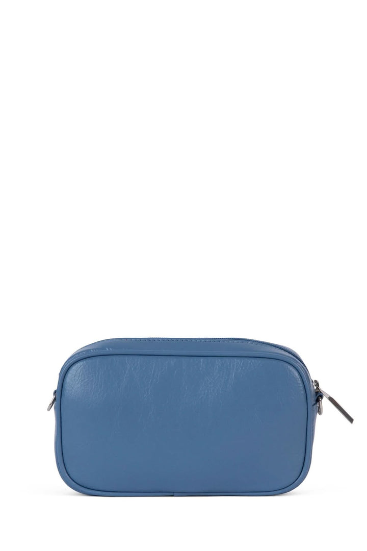 Sac à mains bleu avec fermeture éclaire, design élégant et compact, parfait pour les essentiels au quotidien.