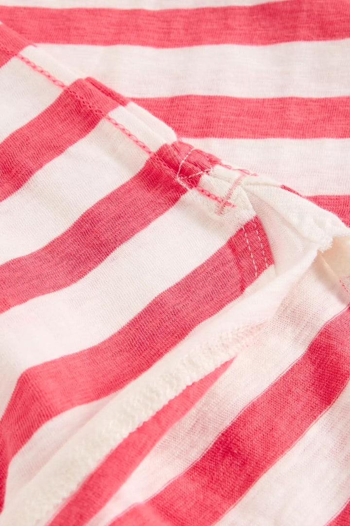 T-shirt rayé à manches longues en tissu doux avec motif rayé rouge et blanc, idéal pour un style décontracté.