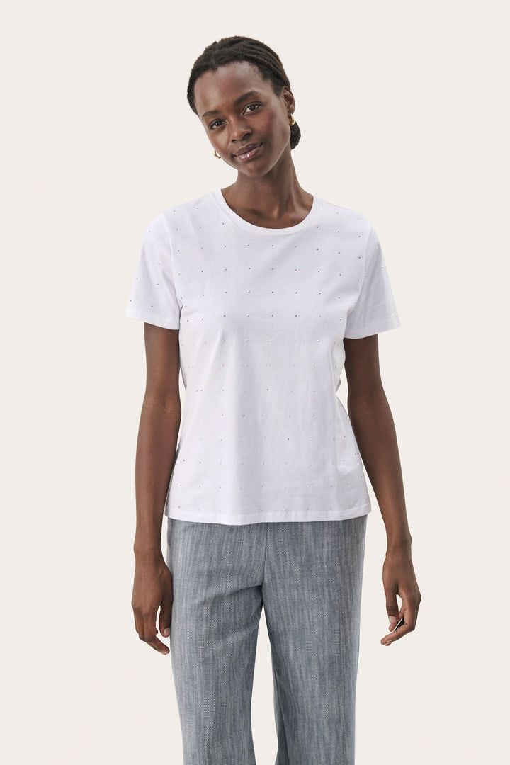 T-shirt en coton biologique blanc avec détails scintillants, coupe ample et manches courtes.