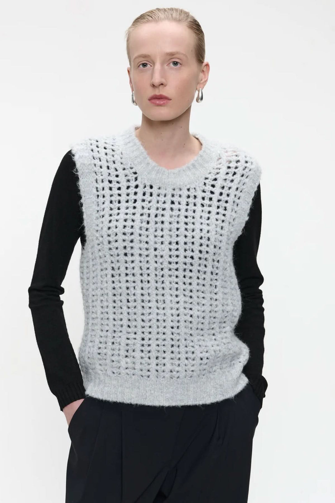 Sleeveless openwork knit