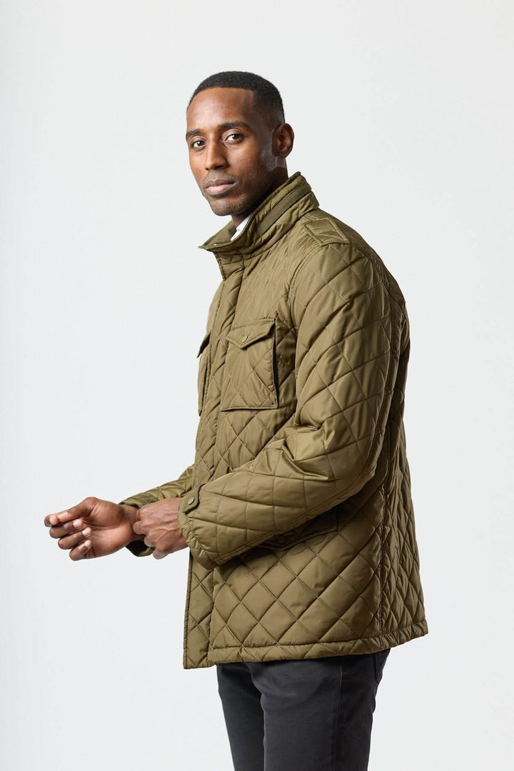 Quilted jacket with stowable hood