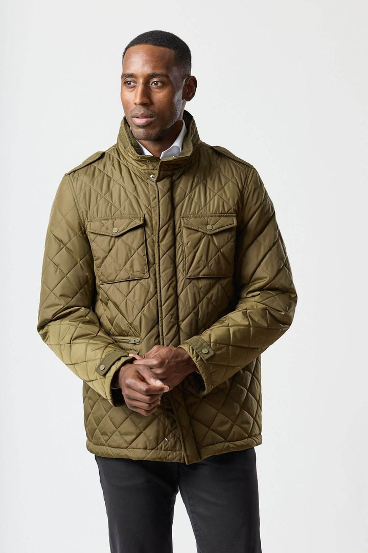 Quilted jacket with stowable hood