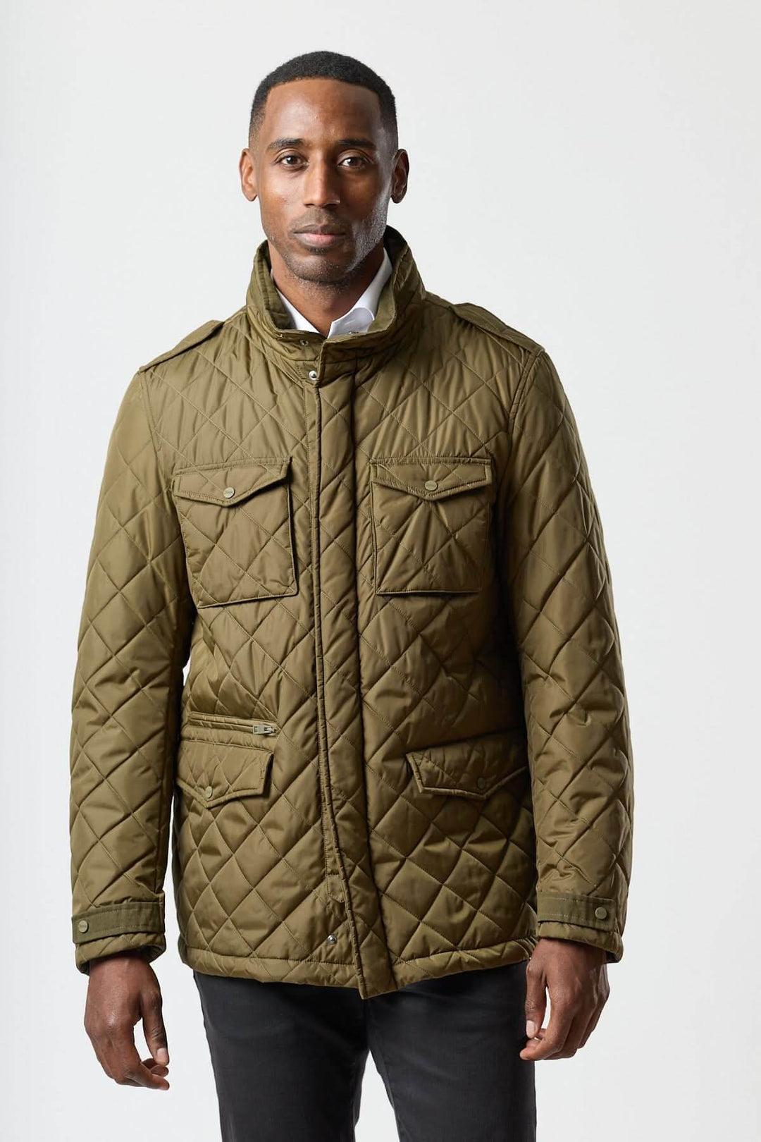 Quilted jacket with stowable hood