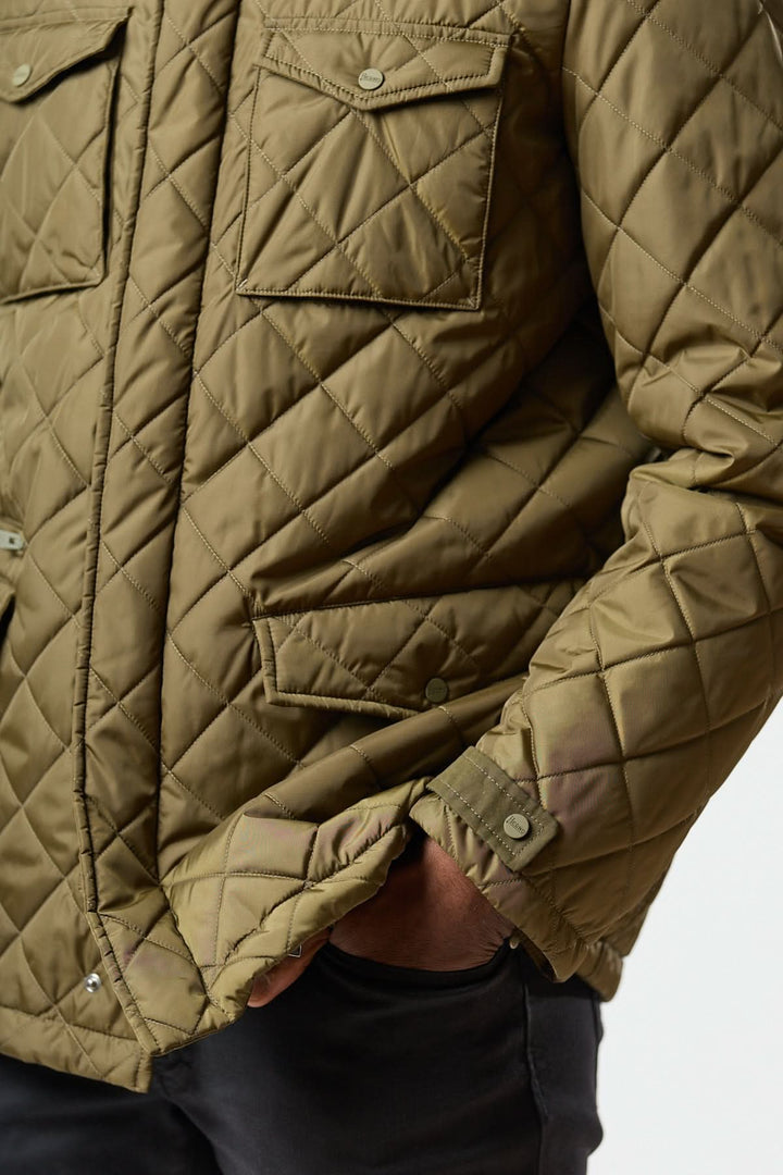 Quilted jacket with stowable hood