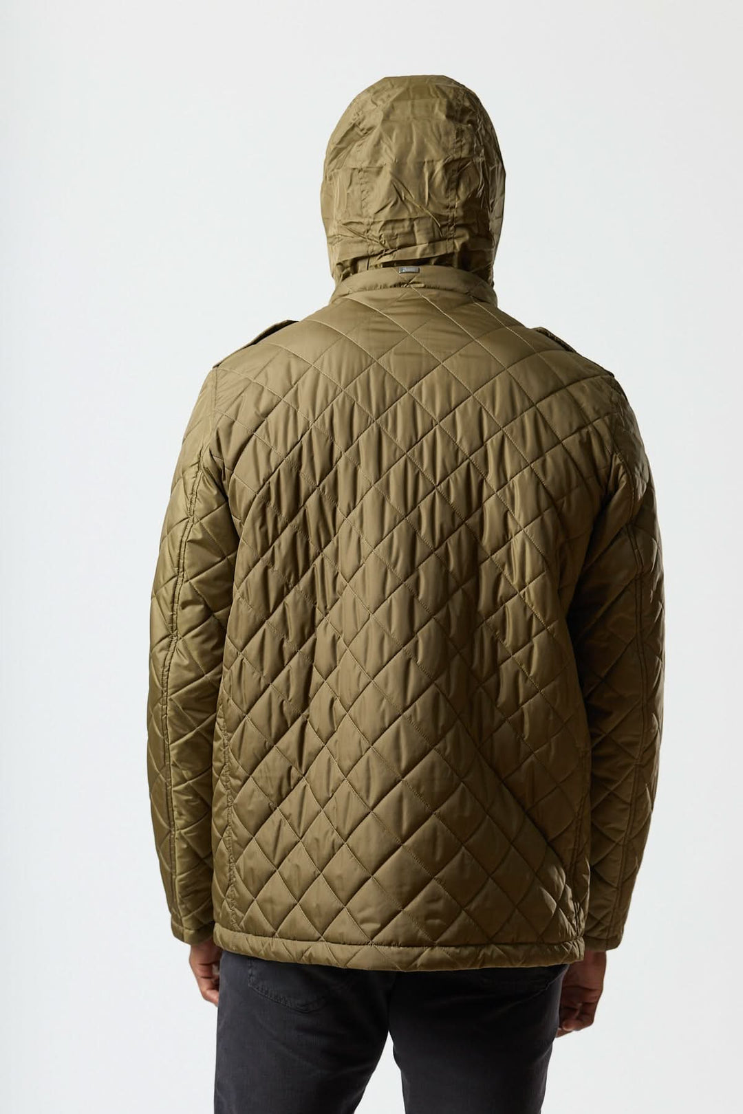 Quilted jacket with stowable hood