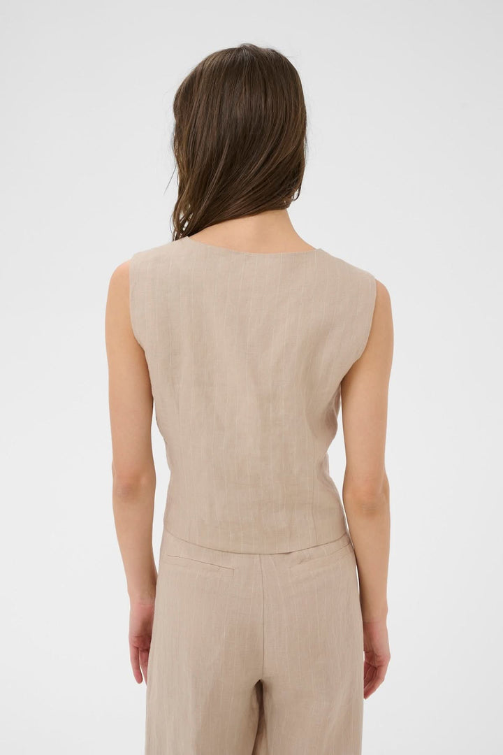 Vue arrière de la Veste sans manches Azania avec motif rayé vertical et coupe moderne.