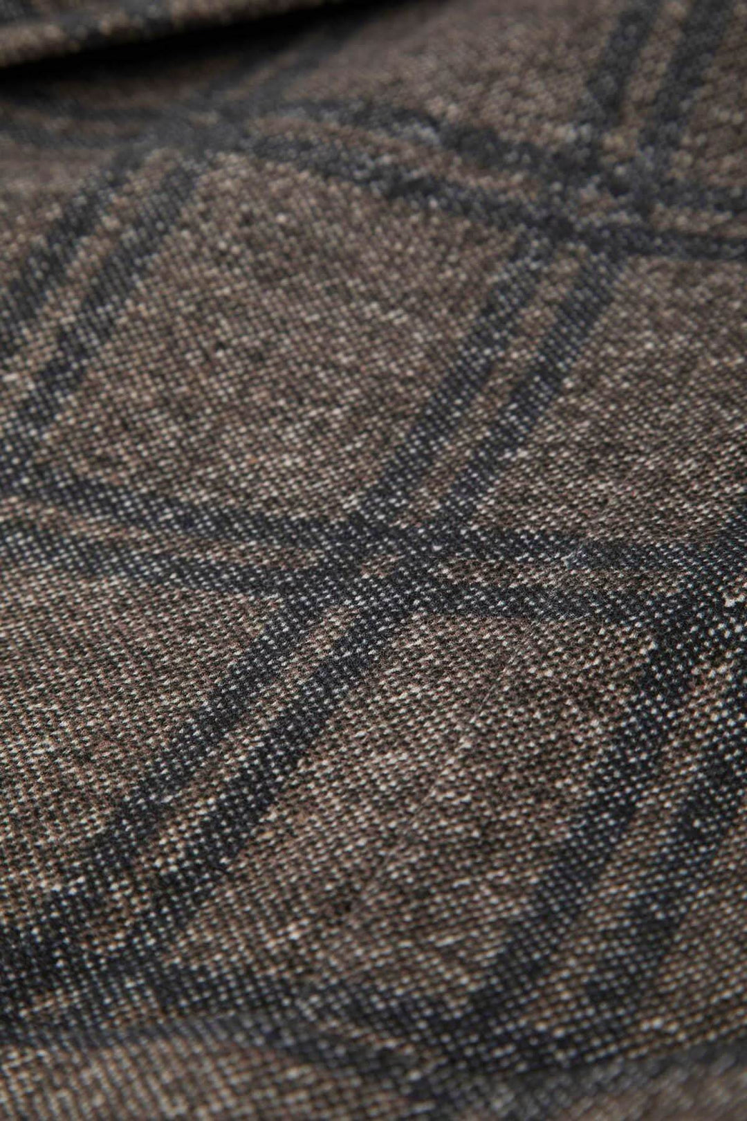 Gros plan du motif à carreaux du Veston à carreaux coton extensible, conçu pour un style moderne et élégant.