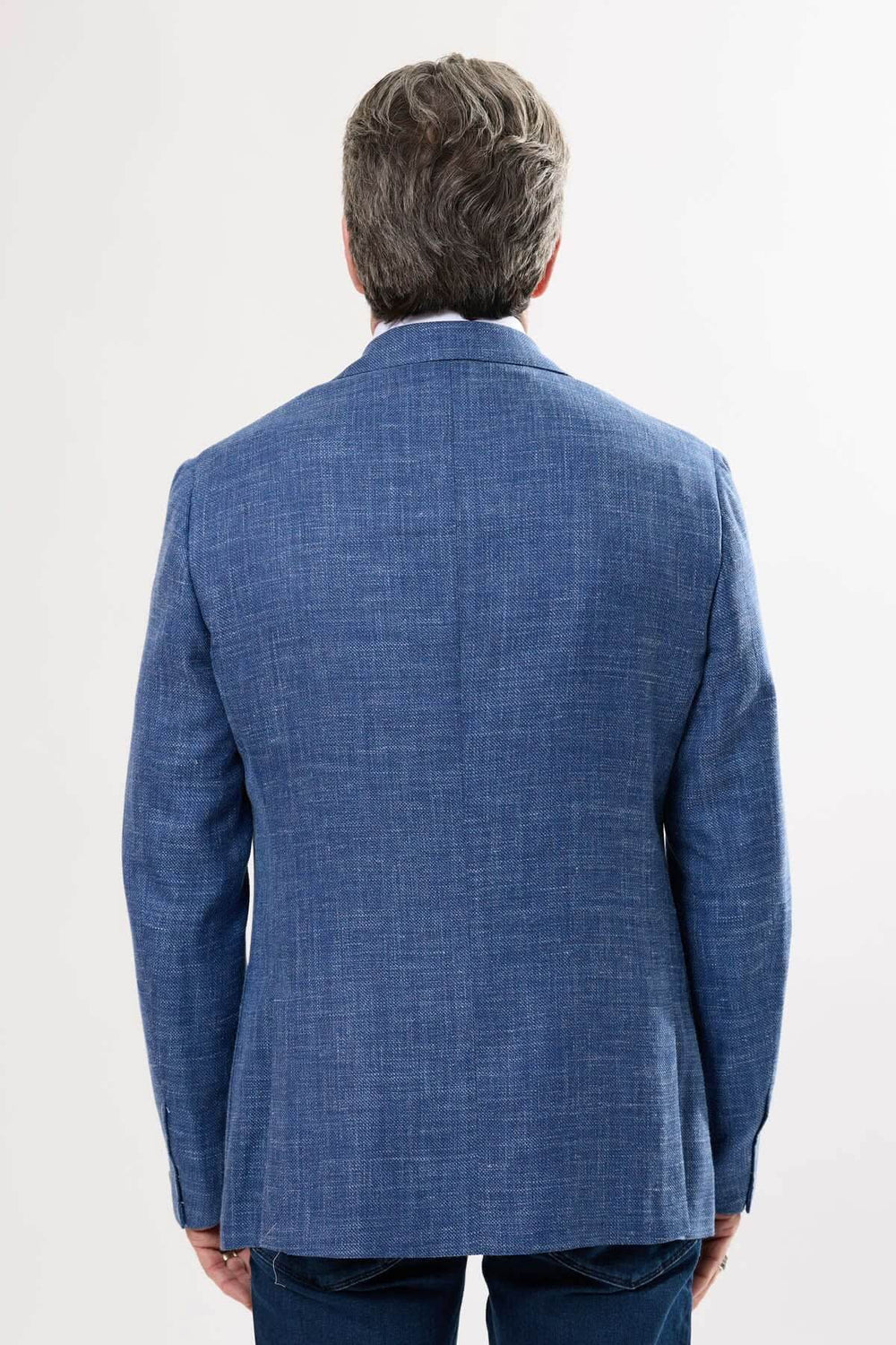 Veston texturé bleu, coupe actuelle, vue arrière, parfait pour un look décontracté ou habillé.