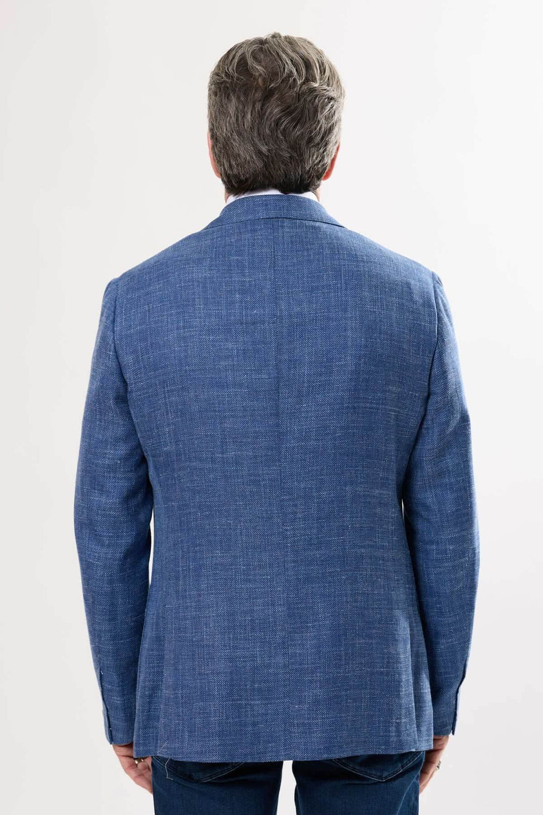Veston texturé bleu, coupe actuelle, vue arrière, parfait pour un look décontracté ou habillé.