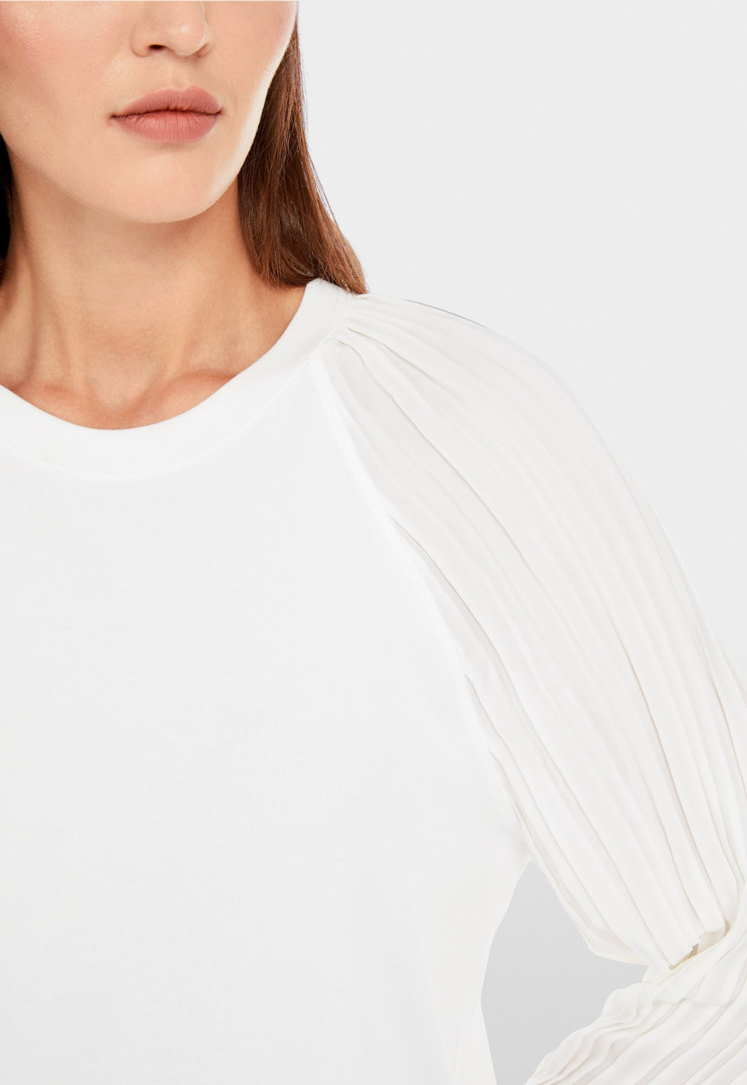 Plain blouse with pleated sleeves