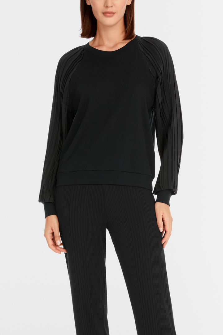 Plain blouse with pleated sleeves