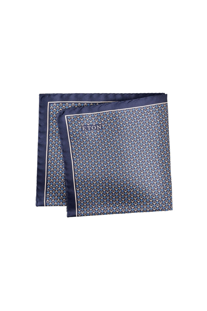 Foulard de poche en soie à motif géométrique, élégant et contemporain, idéal pour ajouter du style à une veste.