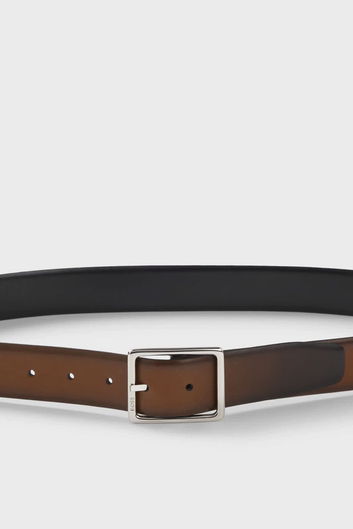 Ceinture réversible noire à boucle métallique vue de face pour homme Hugo Boss