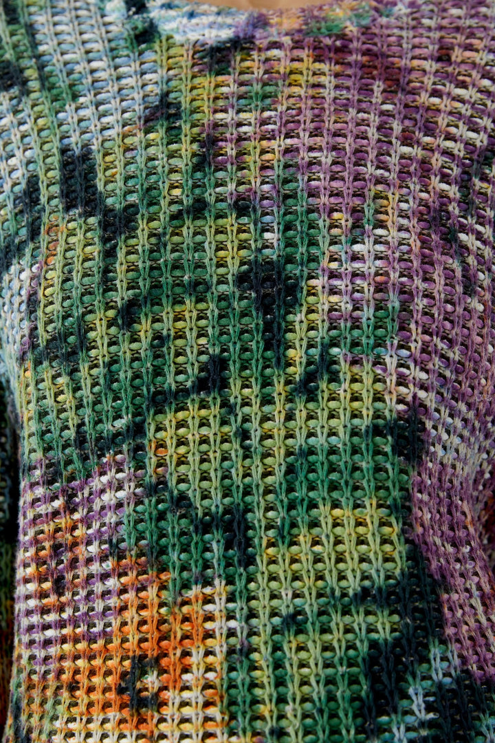 Vue latérale chandail multicolore en maille ajourée avec motifs uniques pour femme - Valérie Simon