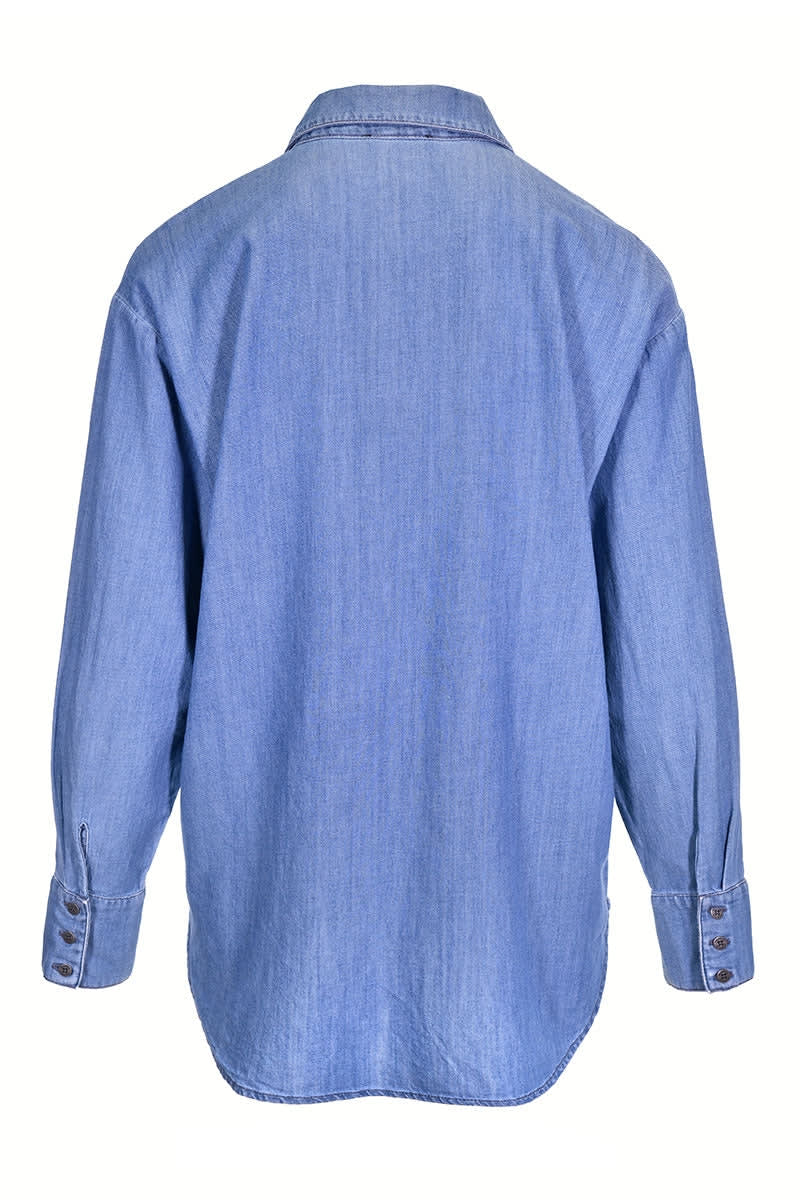 Chemise en denim bleu à poches plaquées vue de face pour femme kennys