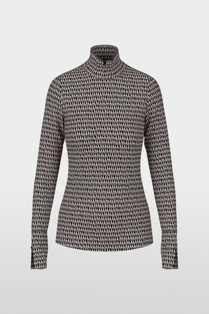 Chandail imprimé pailleté avec col montant et manches longues, tricoté en Allemagne. Modèle moderne et épuré en matières douces.