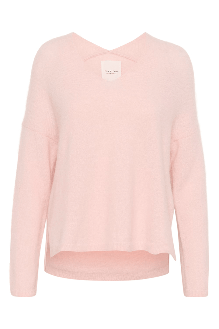 Tricot Titina au style minimaliste, coupe droite, col en V élégant, manches longues, confortable et polyvalent, en maille douce.