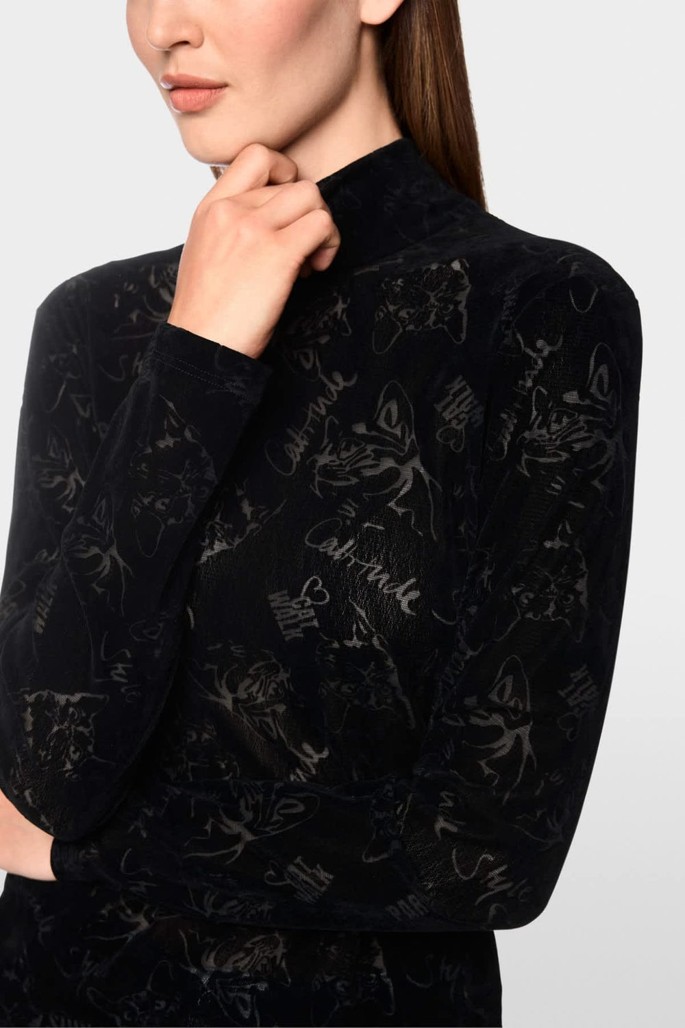 Women's stretch velvet cat-pattern turtleneck top front view by Marc Cain