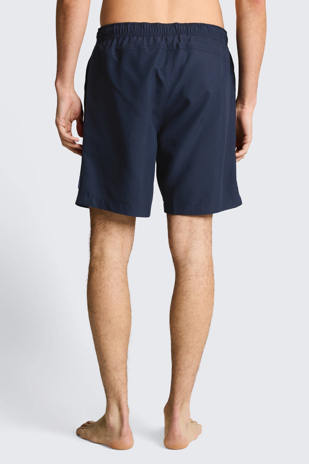Front view of a solid-color red Tom Tailor men's swimsuit with an elastic waistband - Valérie Simon